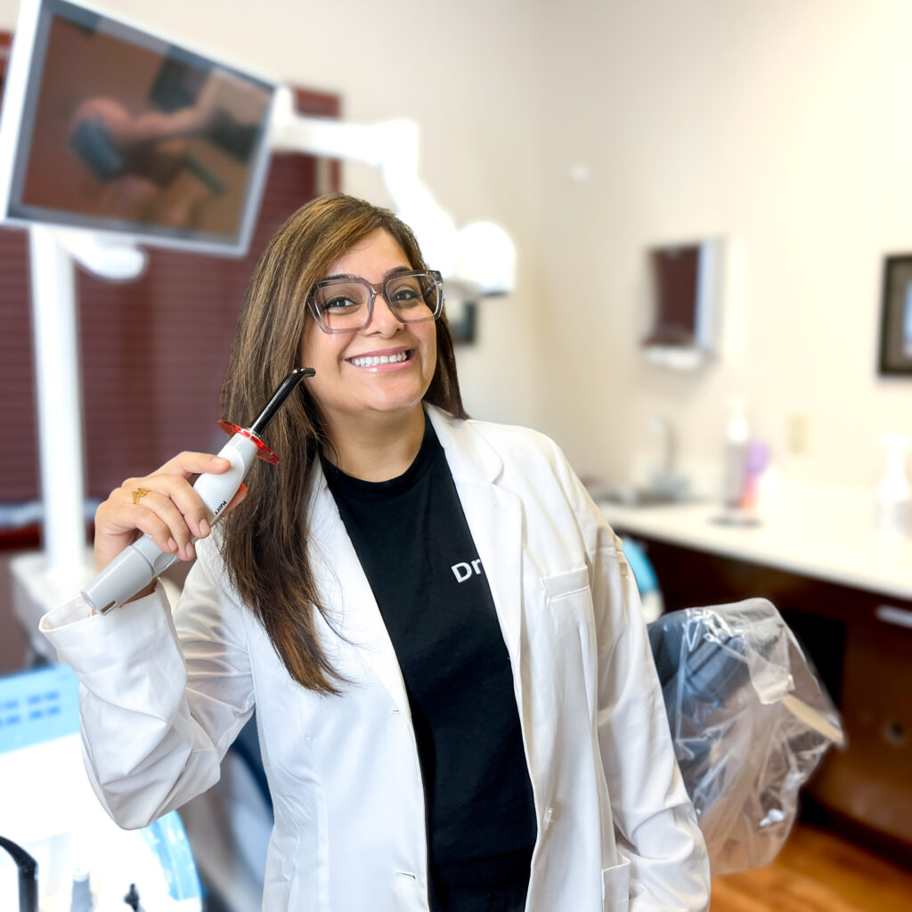 Dr. Payal discussing dental insurance coverage at Parkview Dental in Whiteland, Indiana