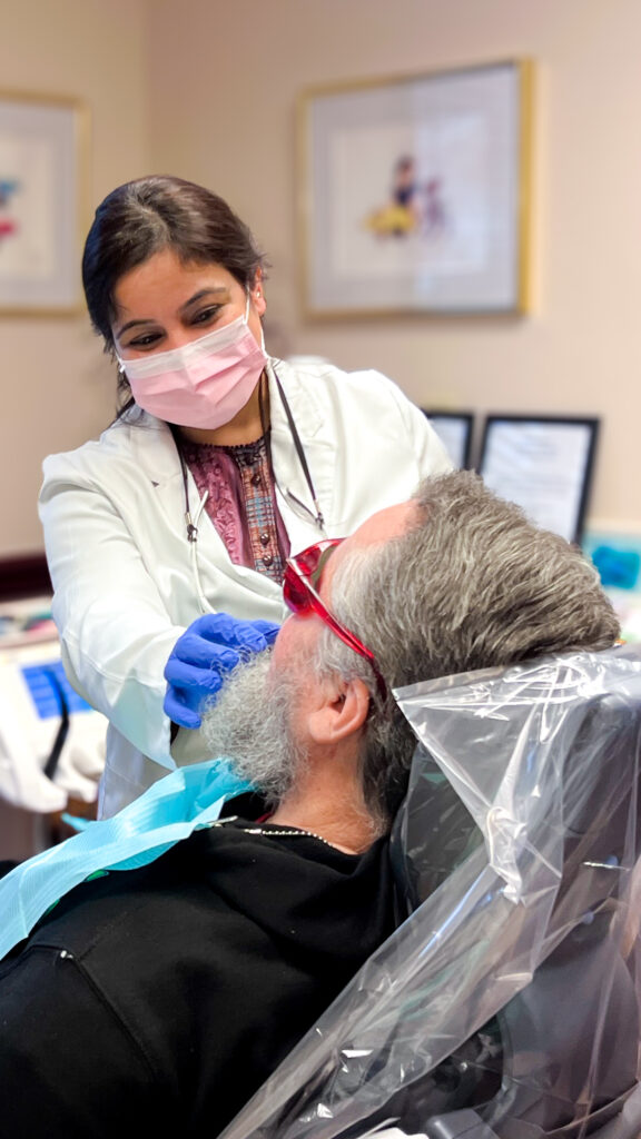 Dr. Payal Singh performing dental treatment at Parkview Dental office